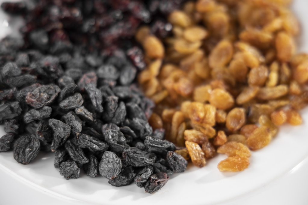 Most producers of raisins use mechanical drying to lower the water activity to  0.51-0.56