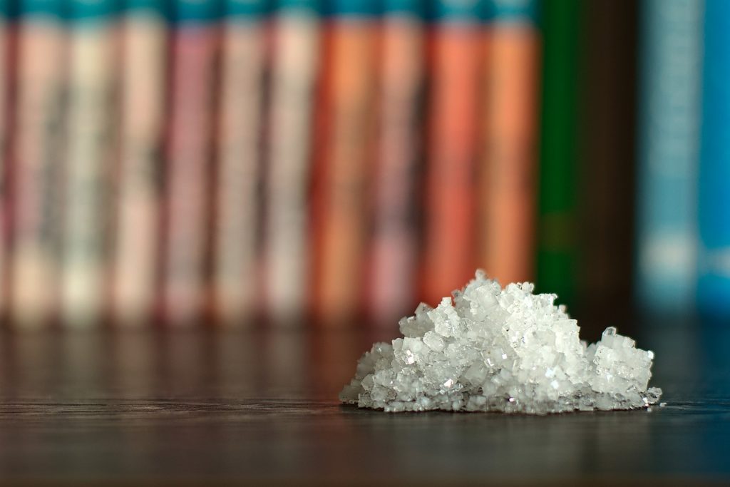 The presence of salt can lower the temperature at which water freezes.